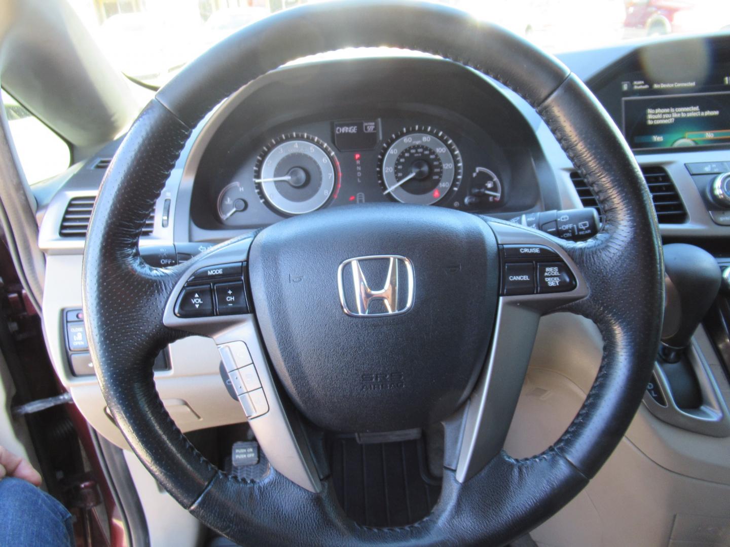 2016 Red /Tan Honda Odyssey EX-L (5FNRL5H62GB) with an 3.5L V6 SOHC 24V engine, Automatic transmission, located at 1511 North Shepherd Dr., Houston, TX, 77008, (281) 657-1221, 29.798361, -95.412560 - 2016 HONDA ODYSSEY EX-L VIN: 5FNRL5H62GB103369 5 F N R L 5 H 6 2 G B 1 0 3 3 6 9 VAN 3.5L V6 F SOHC 24V GASOLINE FRONT WHEEL DRIVE - Photo#3